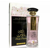 Pink Rose Paris perfume bottle with floral packaging and gold cap